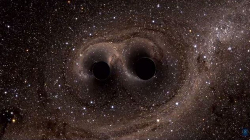 Espace - Simulation de la fusion de trous noirs © LIGO